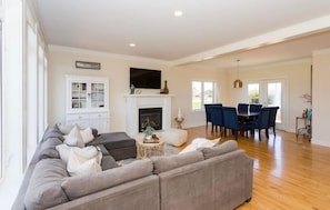 Smart TV, fireplace, books
