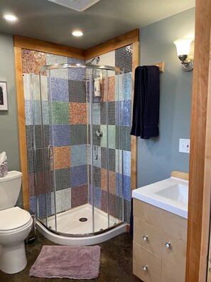 Shower, hair dryer, towels, soap