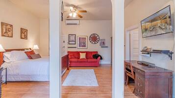 1 bedroom, desk, iron/ironing board, travel crib