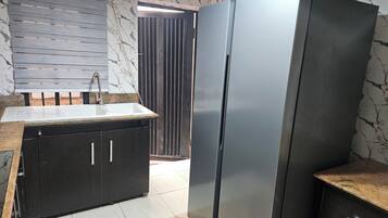 Shower, free toiletries, slippers, towels