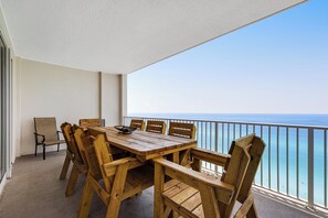 Outdoor dining - Gulf Views, Amazing Location, Gulf-Front Pool + Free Attraction Tickets! (Panama City Beach)
