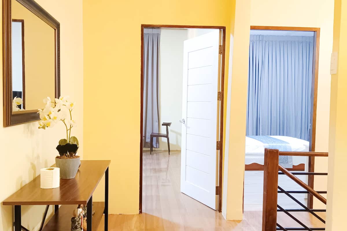 grand villa, 4 bedrooms | living area | 40-inch led tv with digital channels, tv