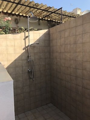Shower, bidet, towels, soap