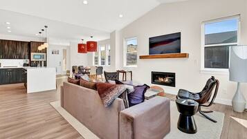 Smart TV, fireplace, table football, books