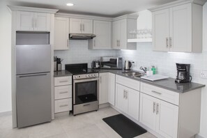 Fridge, oven, coffee/tea maker, electric kettle