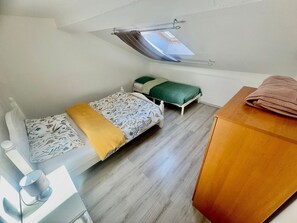 3 bedrooms, desk, iron/ironing board, travel cot