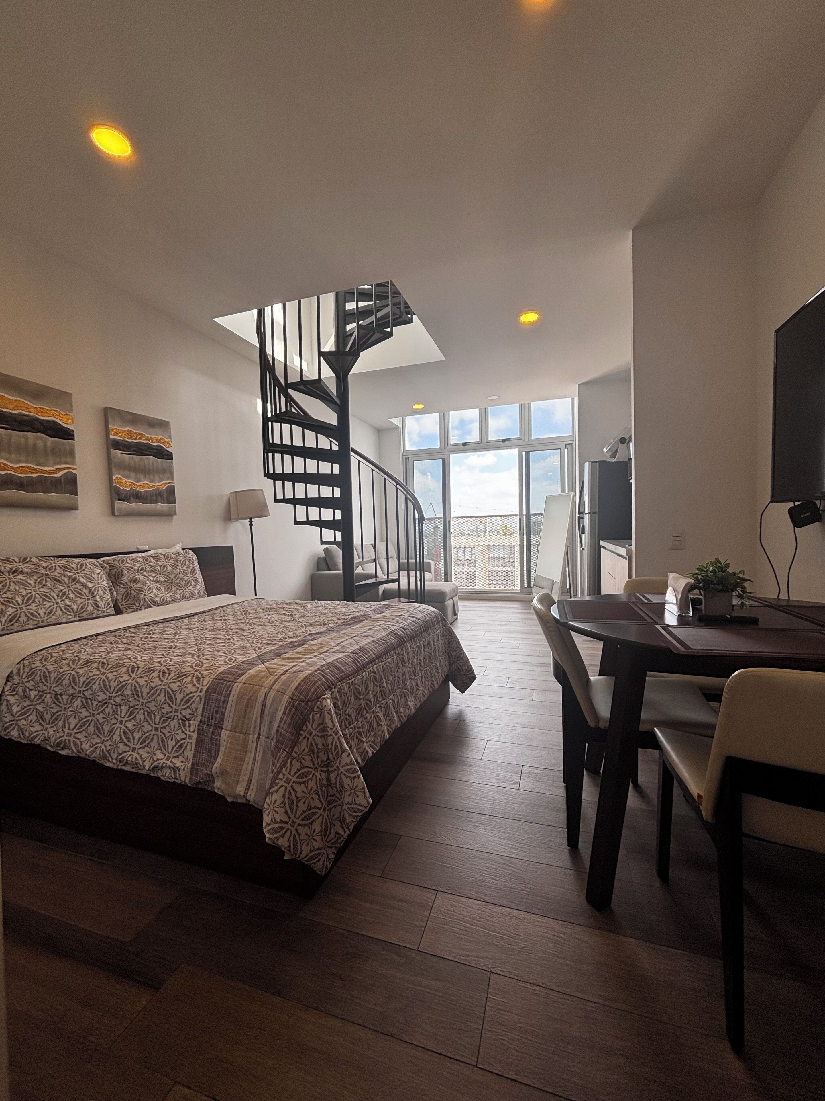 Luxury Studio Suite, 1 Bedroom, City View | Premium bedding, down duvets, individually decorated