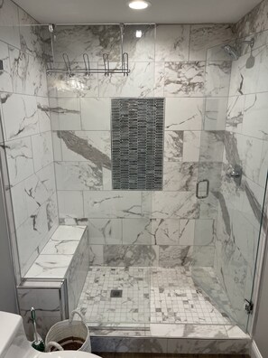 Shower, hair dryer, towels, soap