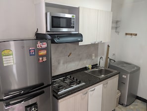 Fridge, microwave, stovetop, cookware/dishes/utensils