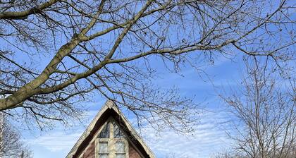 3 bedroom 2 bath renovated A frame on channel to Kuhn lake and the Barbee Chain