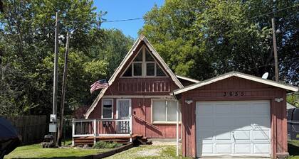 3 bedroom 2 bath renovated A frame on channel to Kuhn lake and the Barbee Chain