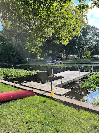 Property grounds. 3 bedroom 2 bath renovated A frame on channel to Kuhn lake and the Barbee Chain