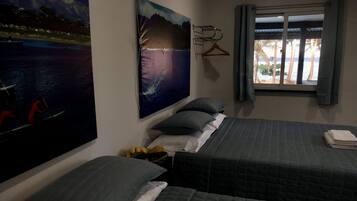 Memory-foam beds, minibar, desk, laptop workspace