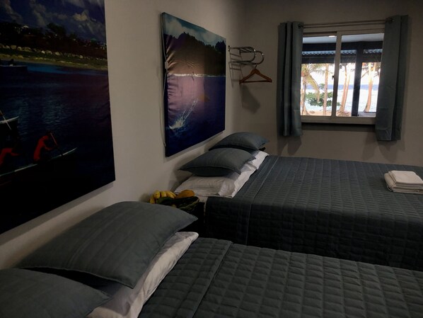 Memory-foam beds, minibar, desk, laptop workspace