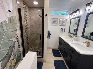Shower, hair dryer, towels, soap