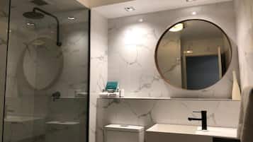 Shower, hair dryer, towels, soap