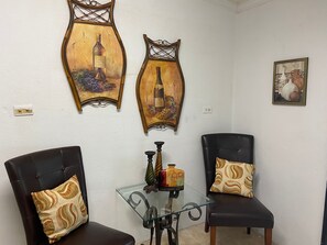 Basic Room, 1 Bedroom, Non Smoking | Living area | 40-inch flat-screen TV with cable channels, TV, Netflix - Rosebud (Rock Sound)