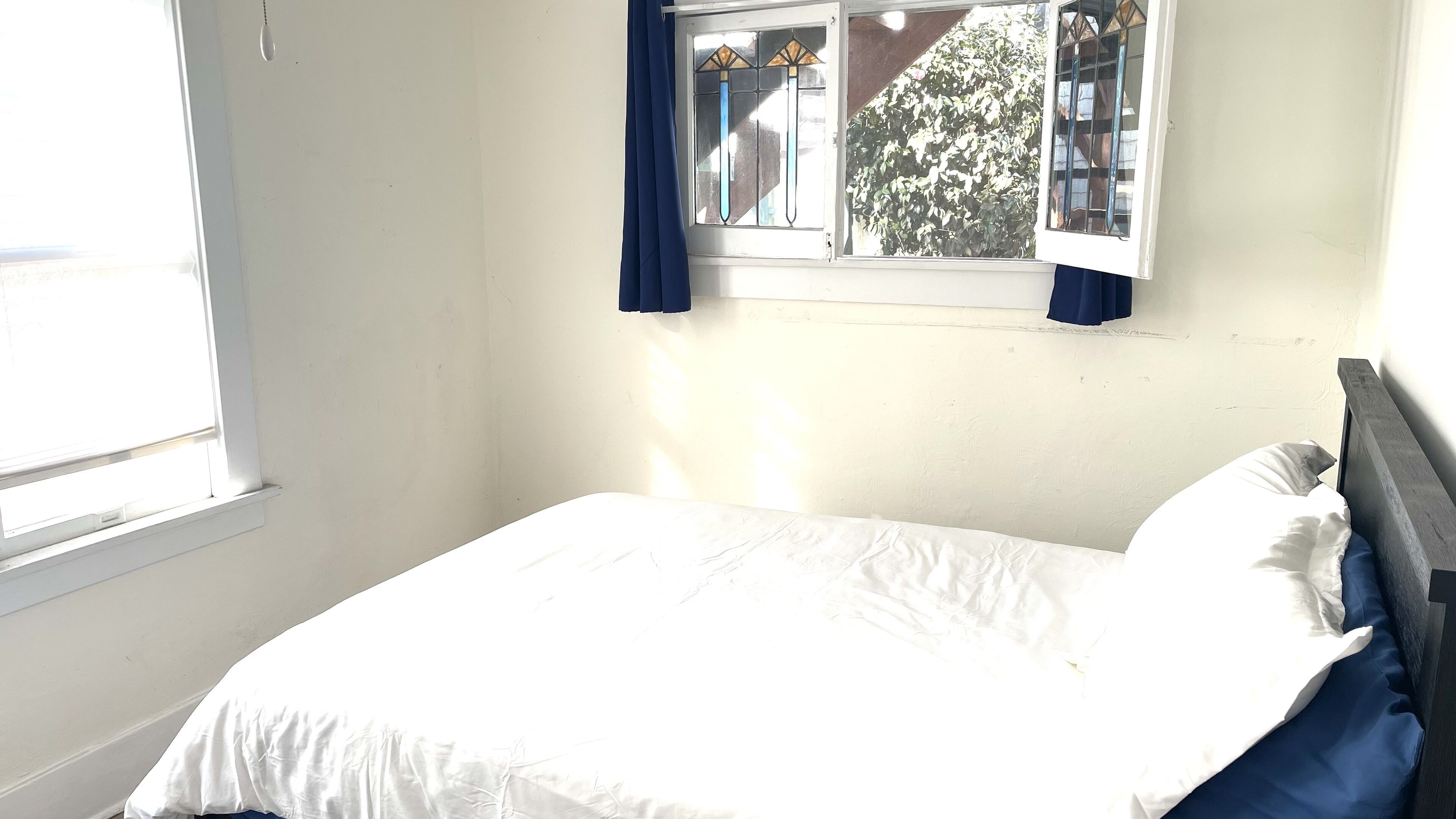 1 bedroom, desk, iron/ironing board, travel crib