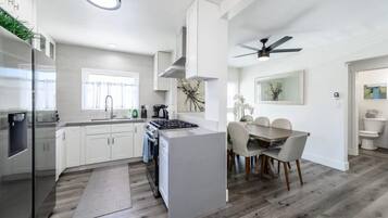Coffee/tea maker, fridge, microwave, oven