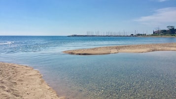 Sulla spiaggia, teli da spiaggia