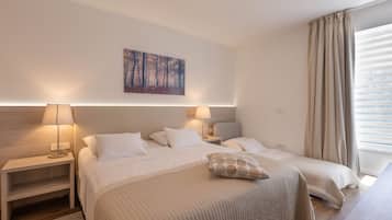 Comfort Triple Room, 1 Queen Bed with Sofa bed | In-room safe, desk, laptop workspace, blackout drapes