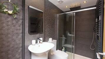 Shower, hair dryer, soap, shampoo