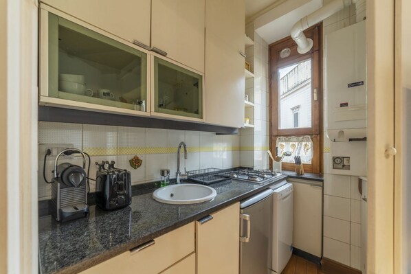 Microwave, stovetop, dishwasher, coffee/tea maker