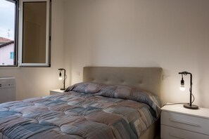 1 habitación, tabla de planchar con plancha, wifi y ropa de cama