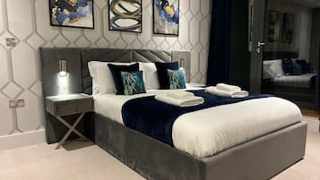 1 bedroom, desk, iron/ironing board, travel crib