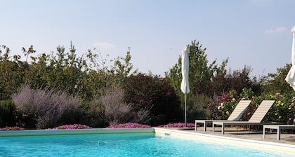 Spacious apartment in beautifully renovated property with shared pool and garden