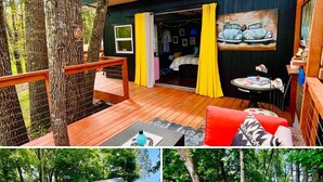 A cabin with a wooden deck, a cozy interior with a bed and a dining area, and a small outdoor shed with a colorful mural. - 3 River Cabins - Private Group Retreat - Downtown Sparta! (North)