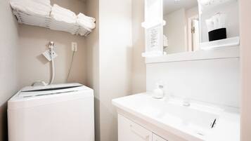 Free toiletries, hair dryer, slippers, electronic bidet