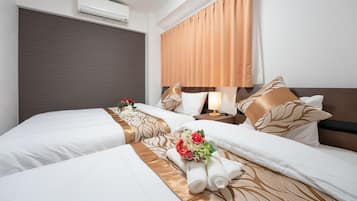 Deluxe Apartment, 2 Bedrooms (GN09) | 2 bedrooms, desk, laptop workspace, blackout drapes