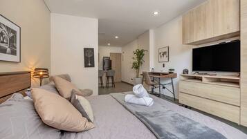 Loft Deluxe (603B) | Cortinas blackout, tabla de planchar con plancha y wifi gratis