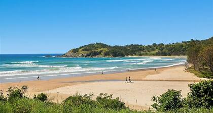 This unique level home is situated on the upper level in a private setting, with mountain views