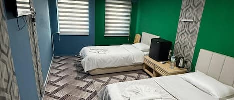 Standaard Twin kamer | Een bureau, een laptopwerkplek, gratis wifi, beddengoed