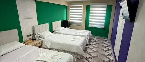 Standard Triple Room | Desk, laptop workspace, free WiFi, bed sheets