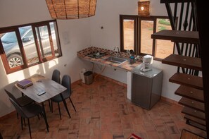 Shower, rainfall showerhead, towels, toilet paper