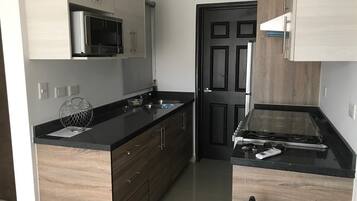 Departamento Confort | Cocina privada | Refrigerador