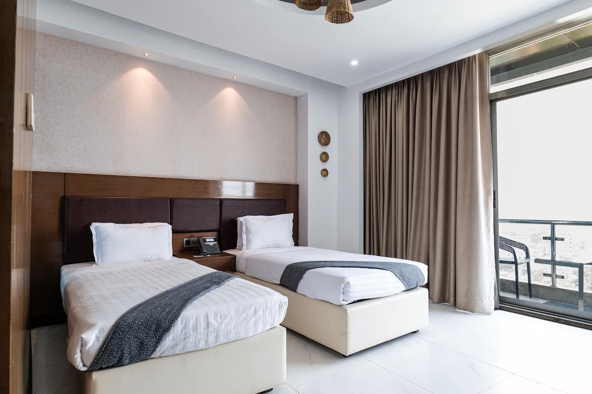 Double or Twin Room | Minibar, desk, laptop workspace, soundproofing