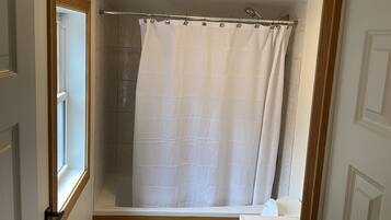 Jetted tub, hair dryer, towels, soap