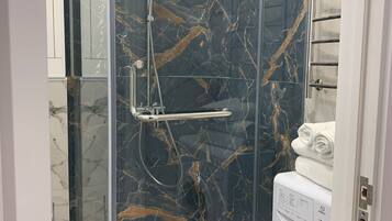 Hair dryer, towels, soap, toilet paper