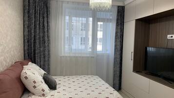 1 chambre, fer et planche à repasser, Wi-Fi gratuit, draps fournis