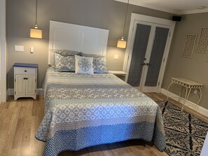 1 bedroom, desk, iron/ironing board, travel crib
