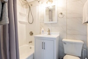 Hair dryer, towels, soap, shampoo