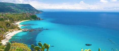 On the beach, sun loungers