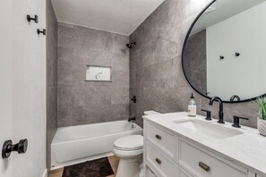 Hair dryer, towels, soap, shampoo