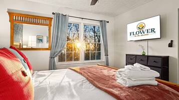 4 bedrooms, desk, iron/ironing board, travel cot