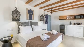 Habitación doble ejecutiva | Cocineta privada | Frigobar, microondas, horno y parrilla de estufa