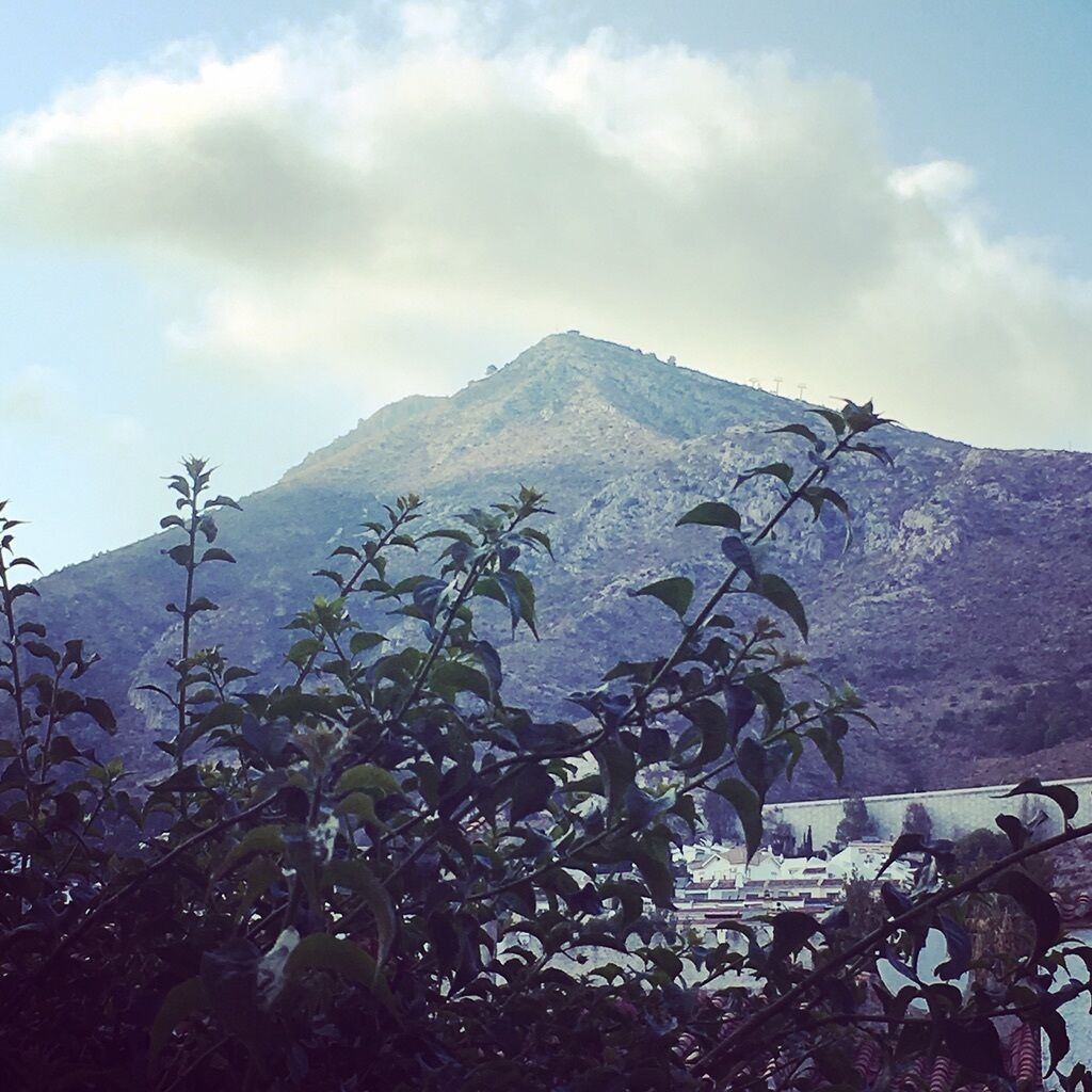 A mountain with a clear sky.